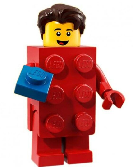 a lego man is holding a blue object in his right hand and wearing a red shirt