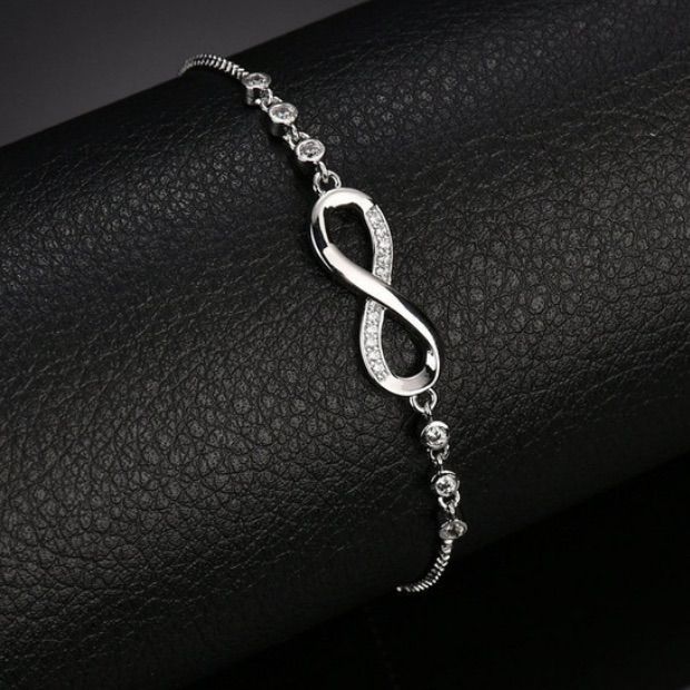 Item Type: Bracelets Metals Type: Silver Bracelet Length: 18cm-20cm, (1 Inch = 2.54 Cm) Style: Trendy Shape: As Pictures Shown Color: Silver Packing Including: 1 Piece Bracelet Infinity Charm Bracelet, Silver Bracelet Designs, Rose Gold Charms, Infinity Charm, Silver Bracelets For Women, Silver Plated Bracelet, Sterling Silver Charm Bracelet, Gold Charm Bracelet, Bridesmaid Bracelet