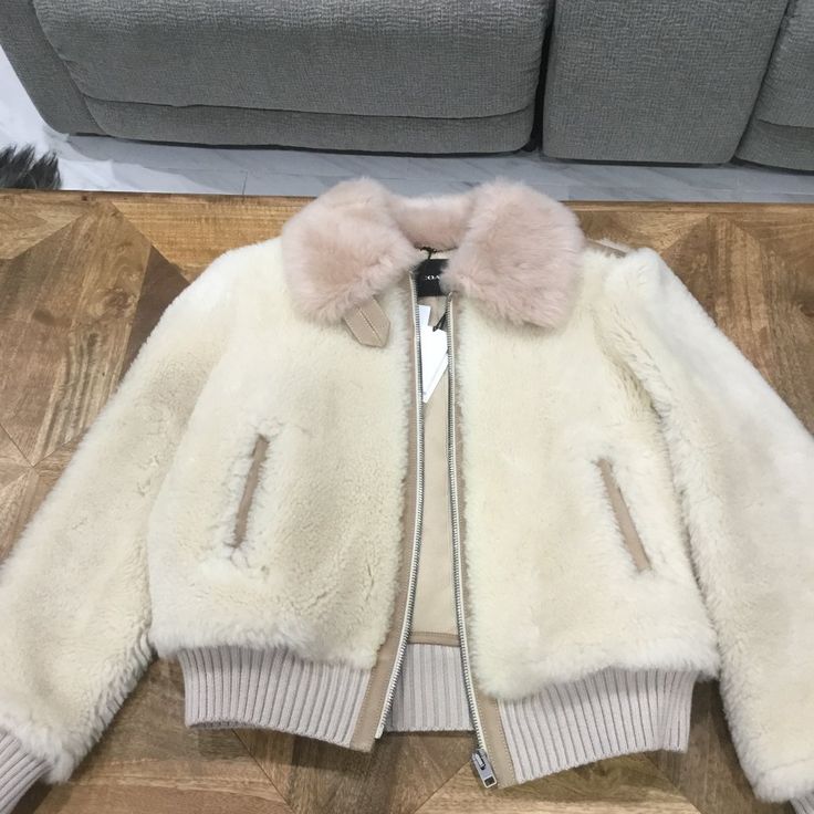 Coach Shearling Jacket Size Xl Brand New With Tags Chest Apprx 46 Around Will Fit Sizes 14-16 Best Cream Shearling Outerwear For Fall, Beige Shearling Fur Coat For Fall, Fall Beige Shearling Fur Coat, Cream Sheepskin Outerwear For Fall, Winter White Sheepskin Outerwear For Fall, Luxury Cream Fur Coat With Faux Fur Lining, Cream Shearling Fur Coat For Fall, Beige Shearling Outerwear With Faux Fur Lining, Luxury Sheepskin Outerwear In Mink Color