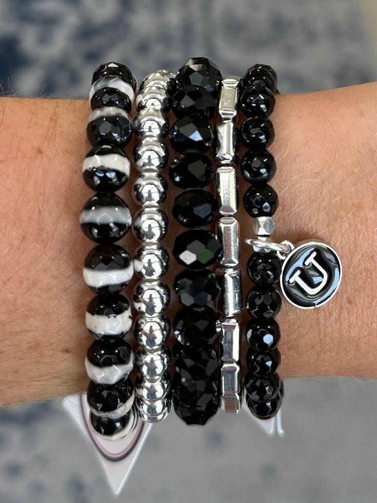 This bracelet is sure to be your go-to accessory for any occasion - dress it up or dress it down for a fashion-forward look that's sure to sparkle! Whether you're just casually styling it up or taking it out for an event, this black faceted bracelet will be the perfect arm-candy for any look. Bracelets made 7 inches unless buyer lets us know to make them smaller or larger. Please refer to our sizing page. HOC-Winter Hoc Winter, Black Bracelet, Black Bracelets, Black Crystals, Arm Candy, Bracelet Stack, Bracelet Making, Occasion Dresses, Fashion Forward