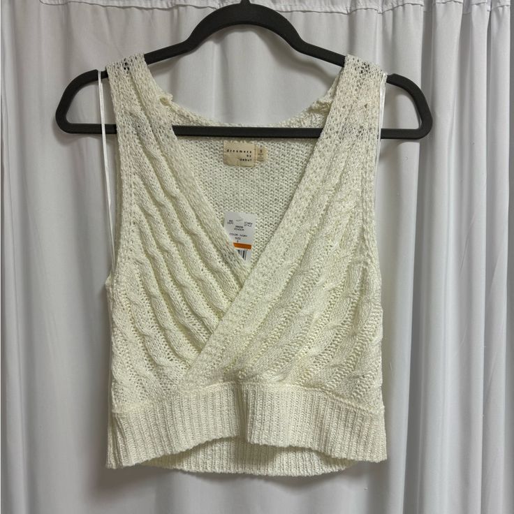 Knit Top By Dreamers By Debut. Never Worn Before. Nwt! Fast Shipping!! 1-2 Day Shipping Item Is Stored In A Smoke Free Home! Feel Free To Reach Out With Any Questions Or Clarification. 5 Stars Seller White Knit V-neck Crop Top, Casual Knit V-neck Crop Top, Casual V-neck Knit Crop Top, Knit Crochet V-neck Top For Winter, Winter V-neck Crochet Knit Top, Beige Knitted Crop Top, Casual Knitted V-neck Top, White Open Knit Sweater Vest, Casual White Open Knit Sweater Vest