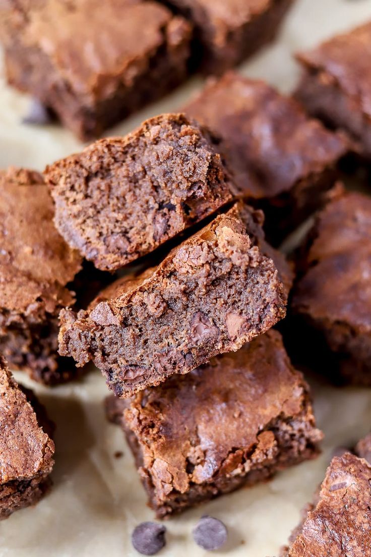 chocolate brownies stacked on top of each other