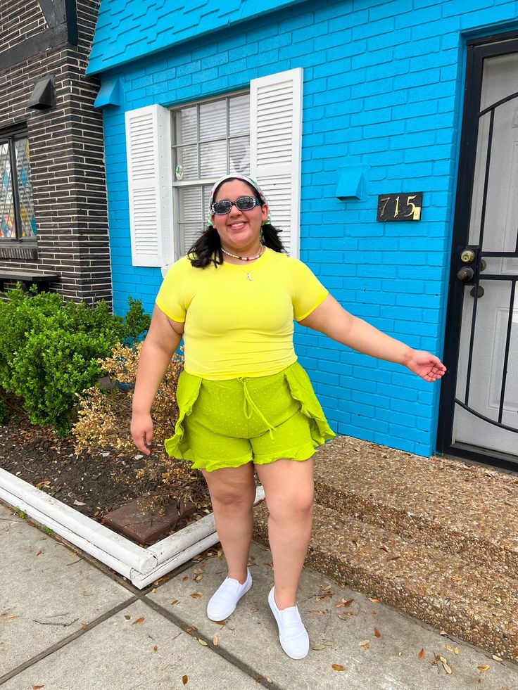 Closet staples don't have to be boring and neutral! Add this yellow top to your wardrobe for the perfect classic tee- wear it under a sundress or style with some fun shorts in the warmer seasons! This shade of yellow looks amazing with greens, pinks, oranges, and blues!! Carry sunshine with you everywhere you go in this tee!! True to size. 92% NYLON 8% SPANDEX The perfect colorful basic tee Yellow styles great with green, orange, pink, and blue Layer with a sundress or your favorite shorts! Hale Fun Green Tops For Day Out, Green Fun Tops For Day Out, Casual Yellow T-shirt For Loungewear, Trendy Lime Green Summer Tops, Yellow Summer T-shirt For Loungewear, Yellow T-shirt For Summer Loungewear, Yellow Fitted Top For Loungewear, Yellow Short Tops For Summer, Yellow Short Sleeve Summer Top