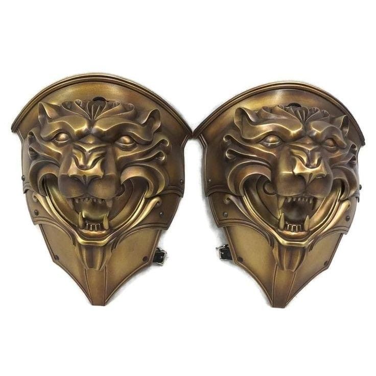 pair of brass lion head wall sconces