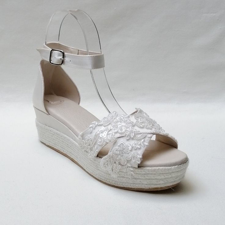 Bridal espadrilles for a beach or informal wedding. So comfortable and chic. Handmade in Spain with the best materials. Genuine leather, jute and embroidery lace. color: off white. A fantastic wedding shoes for you special day. Weges: 5,5cm Platform: 3,5cm Spring Wedding Shoes With Lace And Round Toe, Spring Wedding Lace Shoes With Round Toe, Lace-up Summer Espadrilles, Elegant Beach Wedding Shoes For Spring, Beach Lace-up Adjustable Espadrilles, Adjustable Lace-up Espadrilles For Beach, Summer Wedding Shoes With Platform, Spring Open Toe Beach Wedding Shoes, Spring Beach Wedding Shoes Open Toe