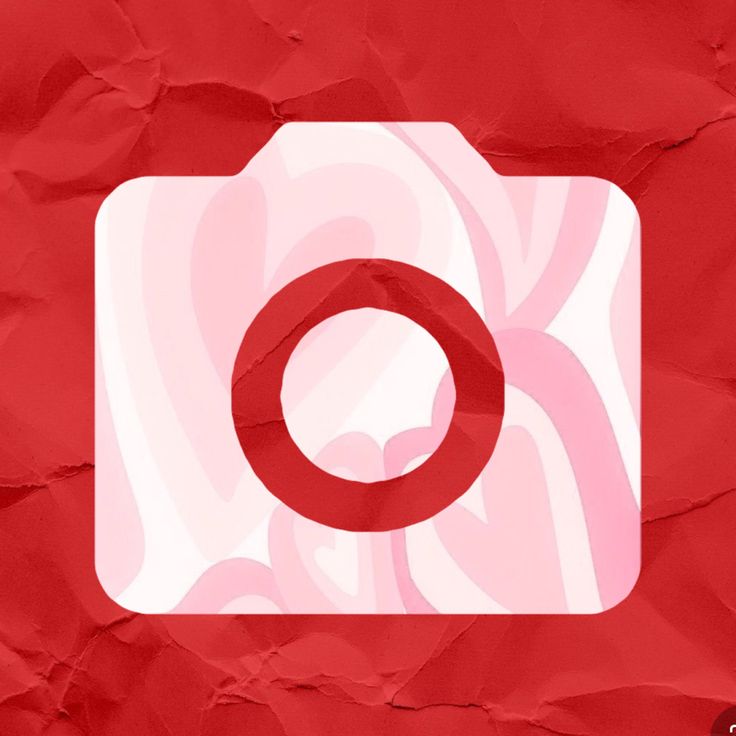 a camera on red paper with the word instagram above it and an image of a circle