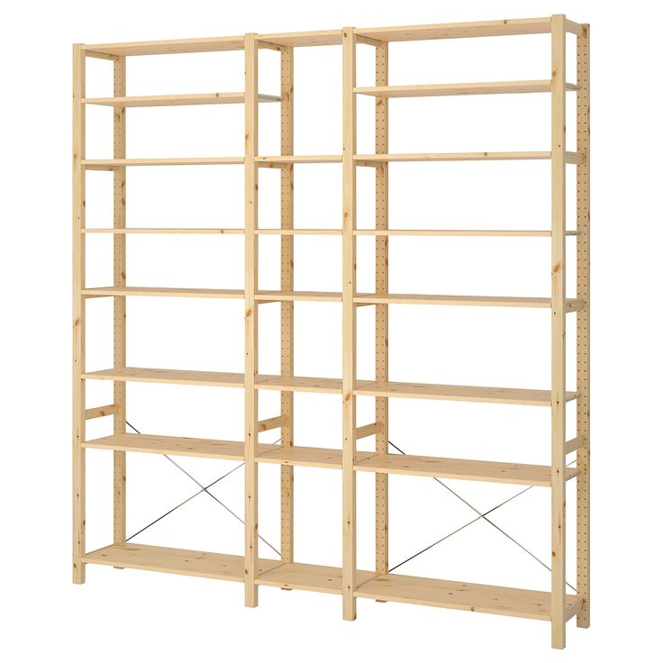 a wooden shelving unit with four shelves on one side and three rows on the other