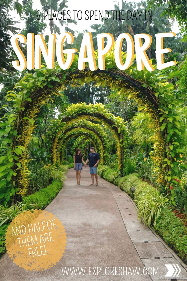 two people walking down a pathway in singapore with the words places to spend the day