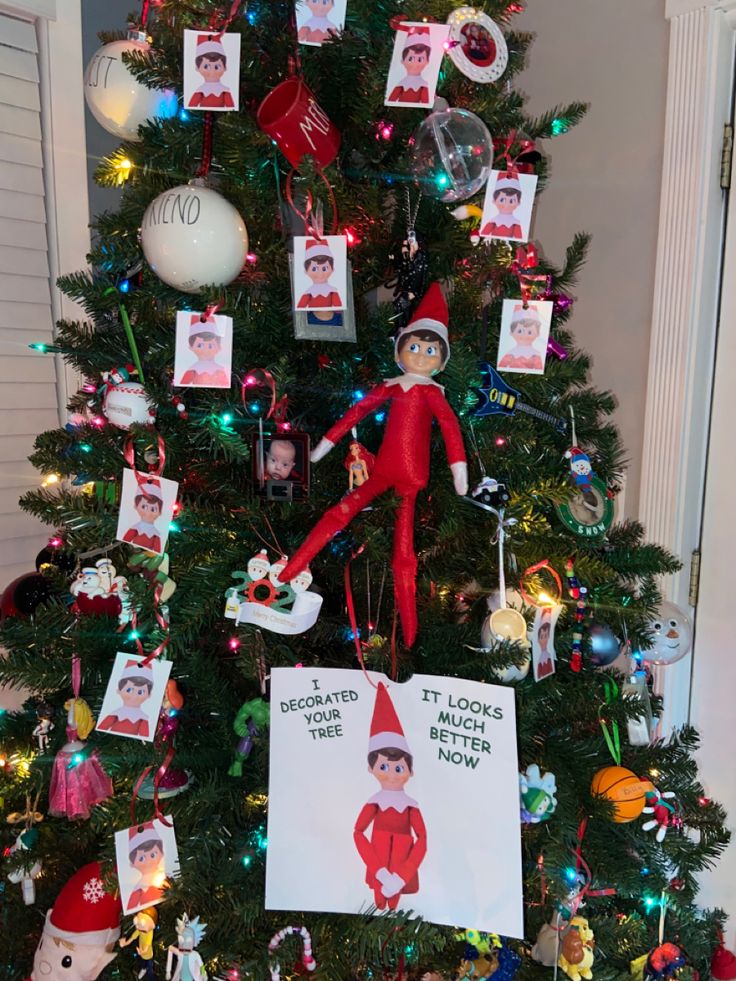 a christmas tree with an elf on it