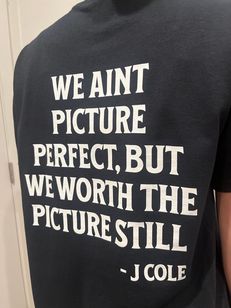 the back of a man's t - shirt that says we are not picture perfect, but we worth the picture still