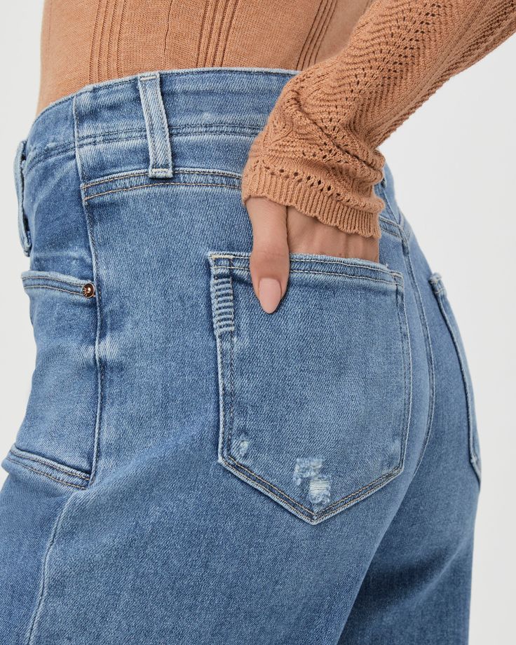 This ultra high-waisted wide leg has an easy, relaxed fit and an ankle length silhouette. This pair is crafted from our PAIGE VINTAGE denim in the perfect light wash with lived-in distressing, natural fading, set in front pockets, double belt loops and a raw hem. PAIGE Vintage takes all of the work out of breaking in your favorite pair of vintage jeans. We've combined the comfort of stretch with everything you love about authentic vintage denim to create super soft jeans that feel perfectly lived-in from the very first wear. Ripped High Waist Cropped Jeans In Medium Wash, High Waist Ripped Cropped Jeans In Medium Wash, High Rise Faded Distressed Flare Jeans, High Rise Ripped Light Wash Flare Jeans, Distressed High Rise Cropped Jeans In Washed Blue, Distressed High Waist Light Wash Flare Jeans, High Rise Washed Blue Distressed Cropped Jeans, High Rise Distressed Washed Blue Cropped Jeans, High Waist Distressed Cropped Jeans In Light Wash