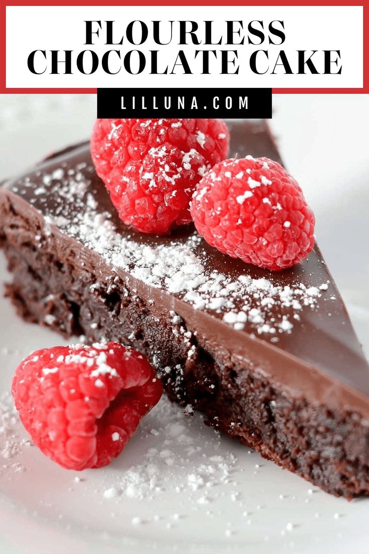 a piece of chocolate cake with raspberries on top and the words flourless chocolate cake above it