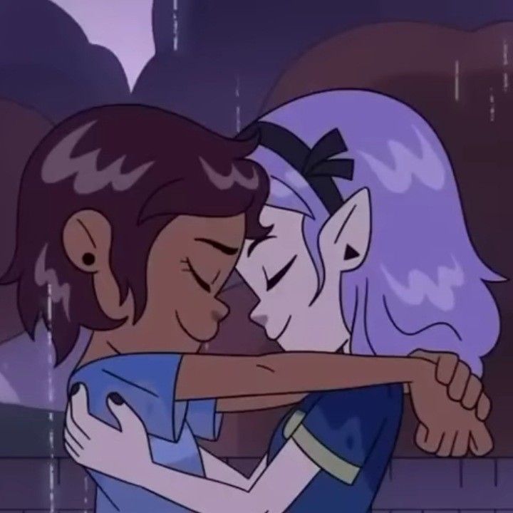 an animated image of two people hugging in the rain