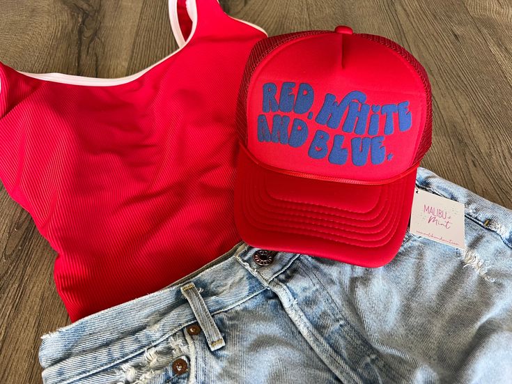 Gear up for the ultimate 4th of July bash with our one size fits all trucker hats! Crafted with breathable mesh and an adjustable strap, these hats are perfect for any patriotic gathering. Whether you're grilling, watching fireworks, or hitting the beach, these hats ensure you'll be celebrating in comfort with red, white, and blue style all day long. Size: One Size Fits All Cheap Curved Brim Trucker Hat For 4th Of July, Cheap Patriotic White Trucker Hat, Summer Baseball Cap For Sports Events, Summer Trucker Baseball Cap, Summer Sports Baseball Cap One Size, Summer Snapback Baseball Cap For Sports Events, Summer Sports Snapback Baseball Cap, Casual Blue Trucker Hat For 4th Of July, Mesh Hats For Sports Events In Summer