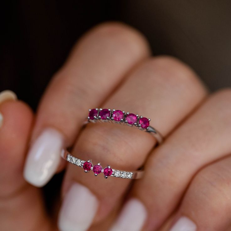 A stacking 5 stone ruby ring in 14K solid white gold. It is ideal for an anniversary gift for women or for an alternative wedding band. This dainty ruby cluster is also a great birthday gift, because ruby is the July birthstone. 100% handcrafted with love! PRODUCT DETAILS ● Material : 14K solid gold - white gold - rose gold ● Gemstones: 5 Rubies natural ● Ruby's Diameter: 2.5mm ● Rubies Weight: 0.41ct ● Gemstones shape: Round/ Brilliant cut RING SIZING For General Reference: ● we use standard US Ruby Stackable Promise Ring, Ruby Birthstone Ring In White Gold For Promise, Fine Jewelry Stackable Ruby Promise Ring, White Gold Ruby Birthstone Promise Ring, White Gold Ruby Ring With Half Eternity For Promise, White Gold Ruby Half Eternity Promise Ring, White Gold Ruby Promise Ring With Round Band, White Gold Ruby Half Eternity Jewelry, White Gold Three Stone Ruby Ring For Wedding