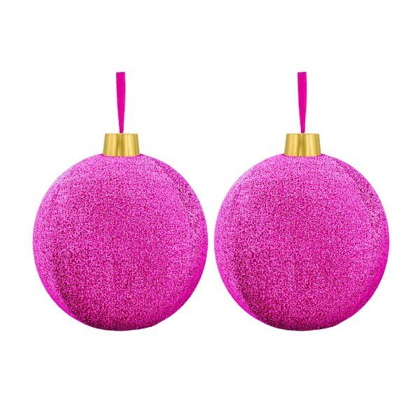 two pink ornaments hanging from a gold colored string on a white background with clipping for text