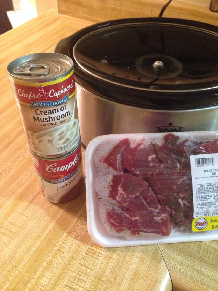 a can of canned meat next to an instant pot roaster and food in the slow cooker