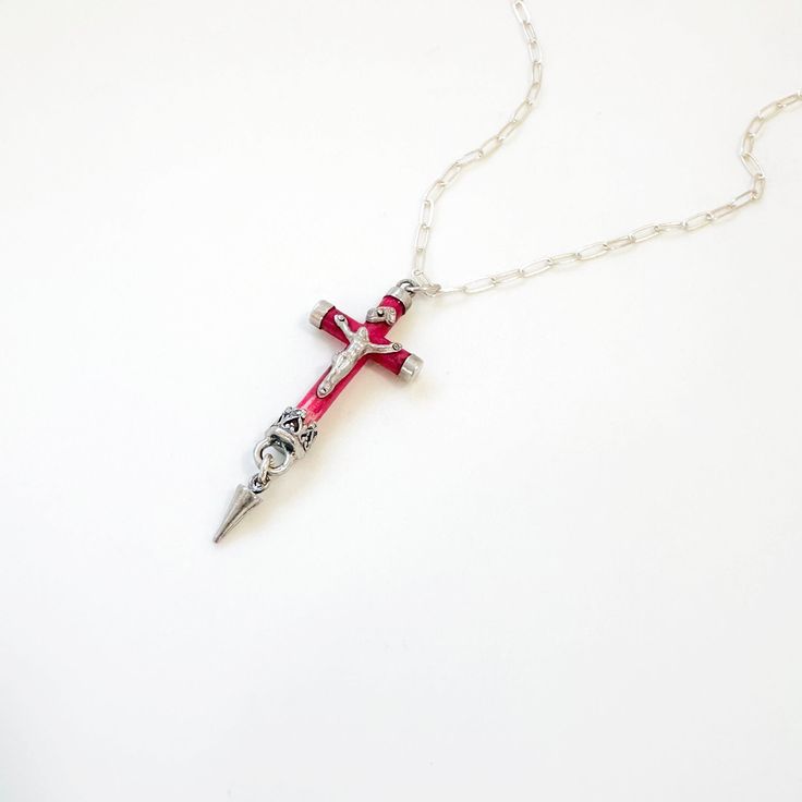 This truly unique and one of a kind and rare vintage cross necklace in coral and sterling silver makes an extra special piece of jewelry or gift for any Christian woman or girl. Inspired by John 3:16, "For God so loved the world that he gave his one and only Son, that whoever believes in him shall not perish but have eternal life." Features a crucifix style with a sterling silver Jesus on coral cross and all sterling silver details and components. A beautiful expression of faith for any Baptism, Confirmation, Christmas or religious gift.  Details: -Paper Clip Style Necklace: 16" (please let us know if you need adjustment or extender chain) -Lobster Clasp Closure -Cross: Approximately 1 1/2" long by 5/8" wide -Cross is a unique and rare vintage piece in sterling and coral details -We will s Unique Sterling Silver Cross Necklace, Sterling Silver Crucifix Necklace For Jewelry Making, Spiritual Crucifix Cross Necklace For Jewelry Making, Red Cross Pendant Necklace Gift, Red Cross Pendant Necklace For Gift, Pink Cross Necklace For Gift, Pink Cross Necklace For Gifts, Red Crucifix Cross Necklace Gift, Red Crucifix Cross Necklace For Gift