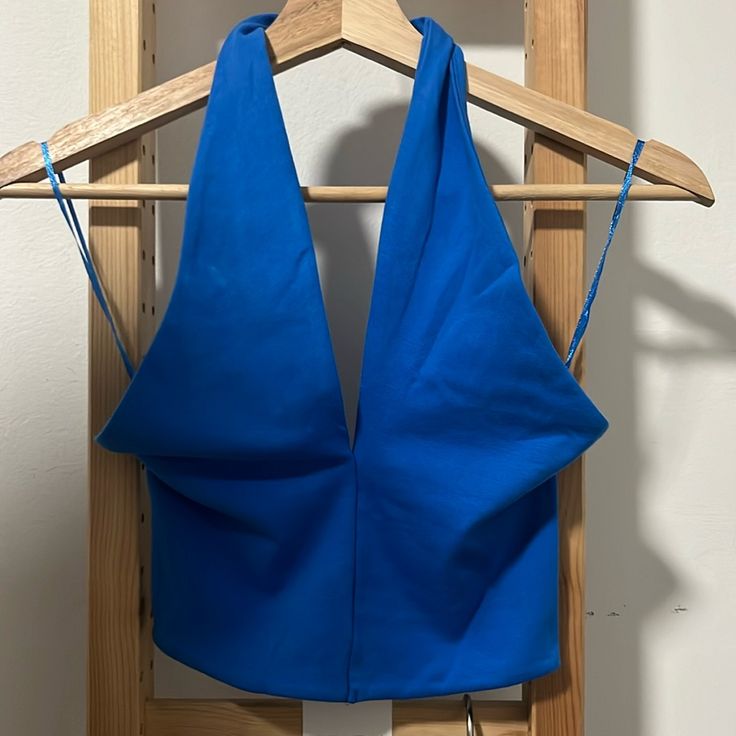 Pit To Pit: 12” Full Length: 18” 95% Cotton 5% Elastane *Has A Great Amount Of Stretch Blue V-neck Halter Top For Spring, Chic Blue Triangle Halter Top, Blue Triangle Halter Top For Spring, Chic Blue Halter Top For Summer, Blue Triangle Halter Top For Party, Blue Halter Top For Beach Party, Blue Fitted Triangle Halter Top, Elegant Blue Halter Top For Beach, Blue Sleeveless Halter Top For Night Out