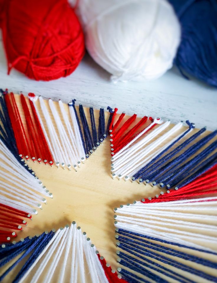 several skeins of yarn are arranged in the shape of an american flag star