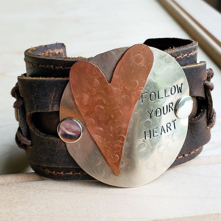 Follow Your Heart Leather Cuff | Belle & Southern Rustic Leather Stamped Jewelry, Rustic Leather Bracelet With Patina For Gift, Rustic Leather Bracelet With Patina As Gift, Distressed Brown Leather Bracelet Gift, Stamped Leather Cuff Bracelet Gift, Rustic Stamped Leather Bracelet Gift, Boho Cuff Bracelet, Hand Stamped Metal, Boho Cuff