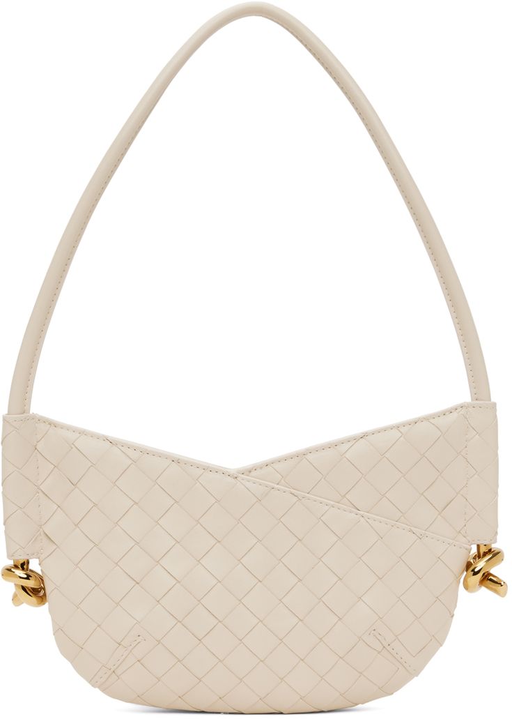 Intrecciato-woven grained lambskin shoulder bag in off-white. · Fixed shoulder strap · Knotted hardware at sides · Zip closure · Suede lining · H6 x W9.75 x D1.5 · Total height: H15.5 Supplier color: Sea salt/Brass Luxury Cream Shoulder Bag With Intrecciato Weave, Luxury Cream Intrecciato Shoulder Bag, Formal Beige Shoulder Bag With Intrecciato Weave, Luxury Cream Shoulder Bag With Woven Leather, Luxury Cream Woven Leather Shoulder Bag, Woven Design, Sea Salt, Bottega Veneta, Bags Women