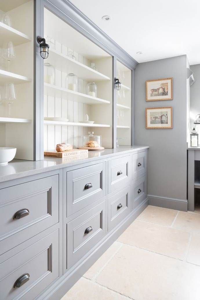 the instagram page shows an image of a kitchen with gray cabinets and white counter tops