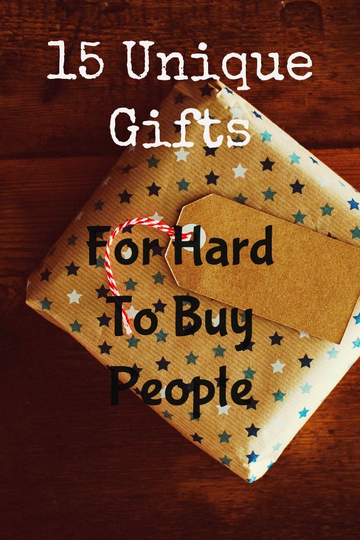 two wrapped presents on top of a wooden table with the words 15 unique gifts for hard to buy people