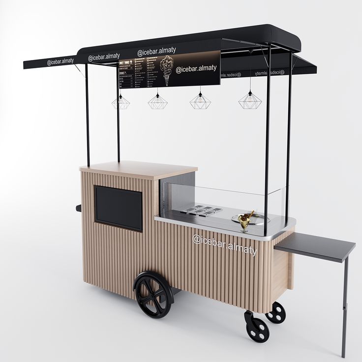 an ice cream cart is shown with wheels