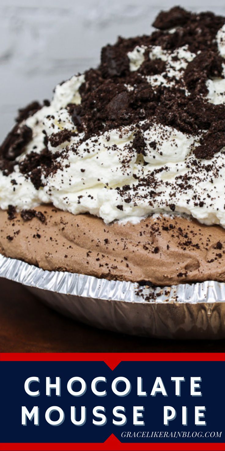 a chocolate mousse pie with whipped cream and oreo crust on top is shown