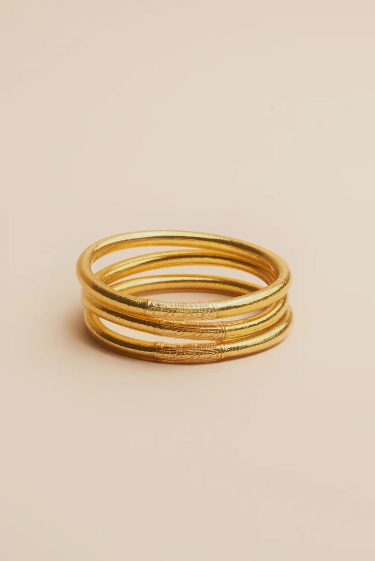 Gold Stackable Wrap Bracelet, Stackable Yellow Gold Brass Bracelets, Gold Spiritual Hand Wrapped Bracelets, Gold Stackable Wrap Bracelet Bangle, Spiritual Hand Wrapped Gold Bracelets, Minimalist Gold Hand Wrapped Bracelets, Spiritual Hand-wrapped Gold Bracelets, Gold Adjustable Bracelet For Puja, Adjustable Gold Bracelet For Puja