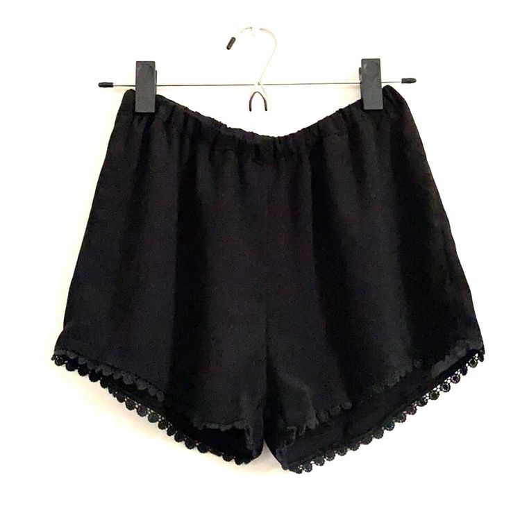 Selling Brandy Melville Lace Shorts. Shorts Have Elastic Waist And Have Lace Detailing On The Bottom Of The Shorts. Perfect For Casual Or Night Out In The Summer! Brand New With Tags Attached. Because It Is Brandy Melville It Is Listed At One Size But Its Can Fit Xs- S. Please Feel Free To Ask Any Questions! Summer Pajama Shorts For Night Out, Black High-waisted Cotton Pajama Shorts, High-waisted Black Cotton Pajama Shorts, Black Short Pants For Loungewear, Black Pajama Shorts With Elastic Waistband, Black High-waisted Pajama Shorts For Summer, Black Elastic Waistband Pajama Shorts, Black Summer Shorts For Loungewear, Black Pajama Shorts For Summer Vacation