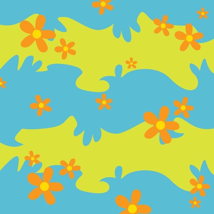 an orange and blue flower pattern is shown on a green, blue, and yellow background