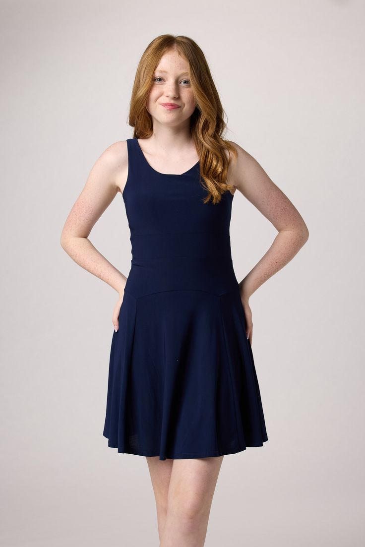 Get ready to turn heads in this classic skater dress. Made with all over stretch, this dress is perfect for standing out in style with a little flare. Shop the latest seasonal trend and be the center of attention wherever you go! Ginger is wearing a size 14 Height 5'5, Waist 27", Bust 31", Hips 35" Pull on style Double lined Made in Los Angeles, CA Fit And Flare A-line Mini Dress In Elastane, Knee-length Lined Mini Dress With Stretch, Knee-length Stretch Mini Dress With Lining, Summer A-line Midi Dress With Flattering Cut, Stretch A-line Mini Dress With Lining, Stretch Knee-length Lined Mini Dress, Summer A-line Dresses With Flattering Cut, Summer A-line Dresses With Flattering Silhouette, Classic Fit And Flare A-line Dress