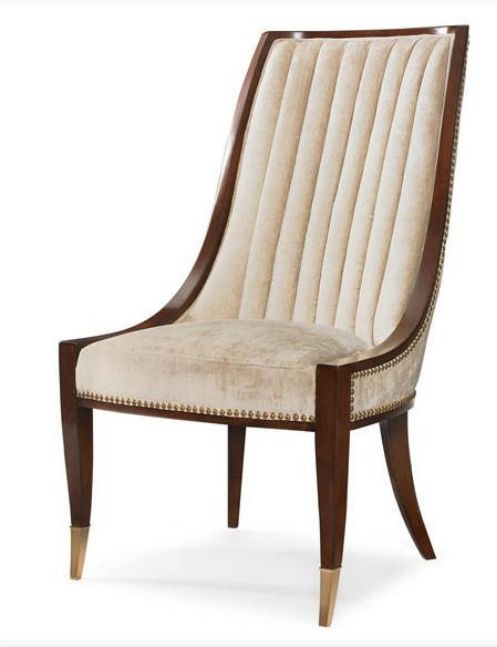 an upholstered chair with wooden legs and beige fabric on the back, against a white background