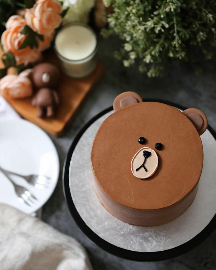 there is a cake with a bear face on it