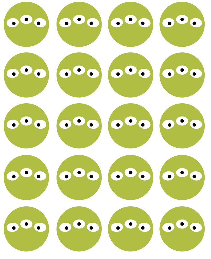 an image of green faces with eyes on them, all in different shapes and sizes