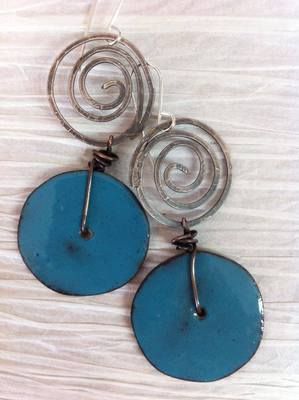 two circular blue earrings with metal wire hangers