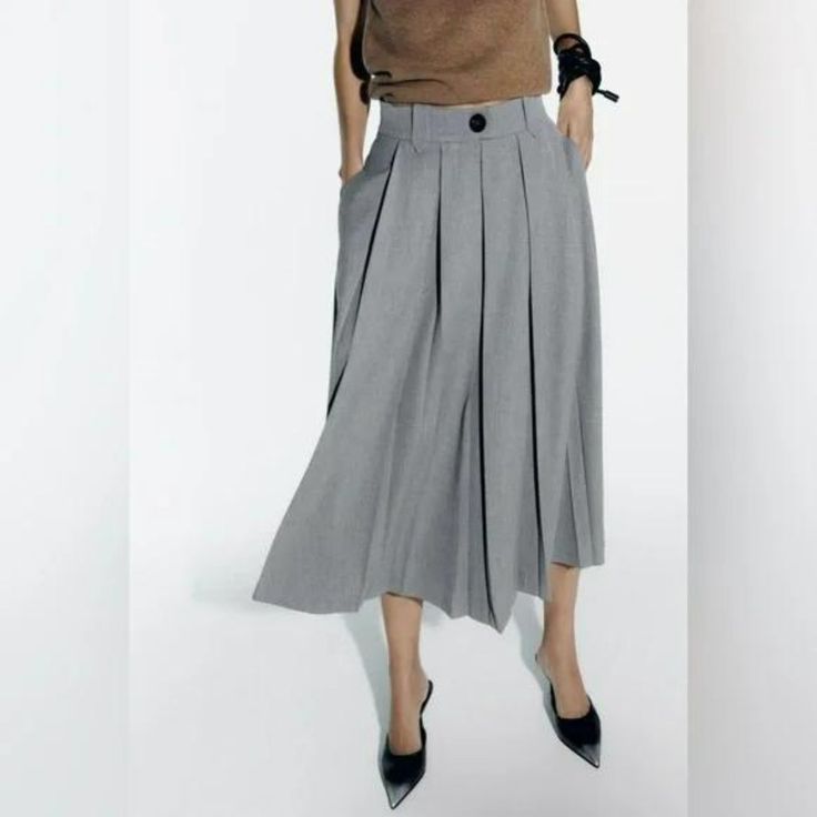 Midi Skirt With Pleats At Waist. Flared Legs. Back Zip Closure. Gray Gray High Waist Pleated Skirt For Spring, Gray High Waist Skirt For Spring, Casual Long Gray Skirt, Casual Gray Long Skirt, Midi Length Workwear Bottoms With Pockets, Relaxed Midi Skirt For Workwear, Midi Bottoms With Pockets For Work, Midi Length Bottoms With Pockets For Work, Midi Length Bottoms For Workwear In Fall