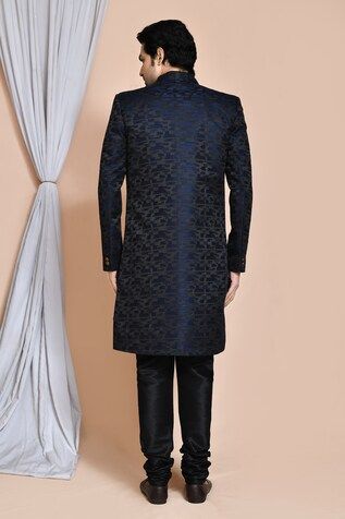 Blue sherwani jacket with all over geometric pattern. Paired with an inner black kurta and churidar. - Aza Fashions Blue Fitted Traditional Wear For Winter, Fitted Straight Kurta Outerwear For Eid, Winter Straight Kurta Bandhgala, Winter Fitted Straight Kurta Bandhgala, Fitted Black Outerwear For Eid, Black Fitted Outerwear For Festivals, Sherwani Jacket, Blue Sherwani, Black Kurta