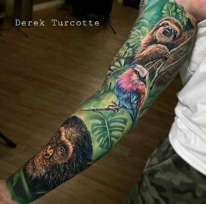 a man with a monkey and gorilla tattoo on his arm