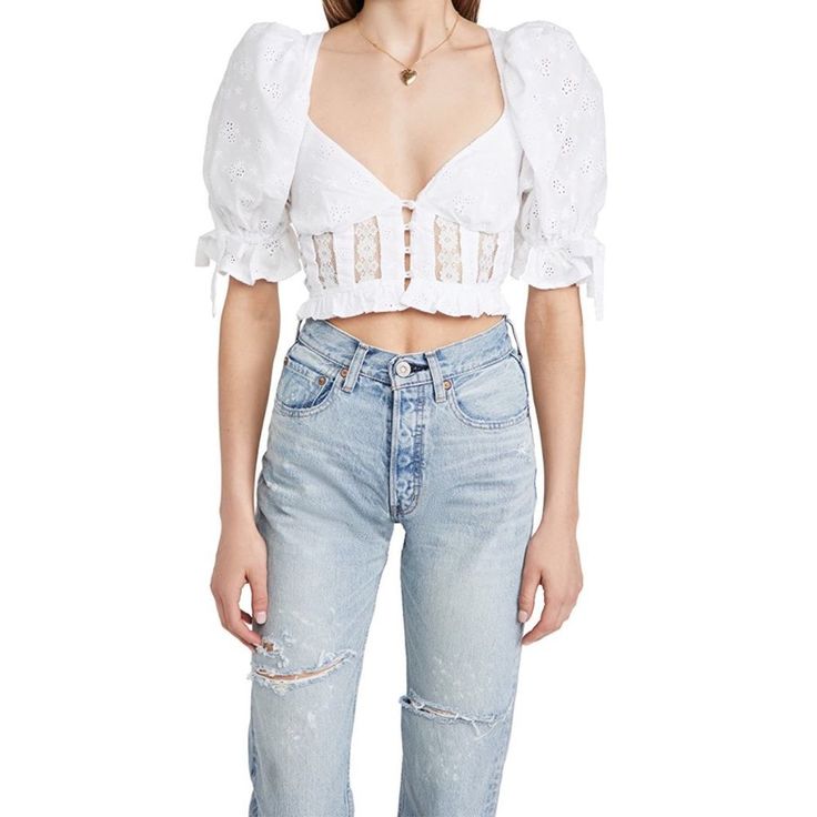 New For Love & Lemons Jean Blouse Size: 1x Color: White Fabric: Lightweight, Non-Stretch Eyelet Floral Embroidery And Lace Trim Plunging Sweetheart Neckline Short Puff Sleeves With Elastic Cuffs And Decorative Ties Cropped Ruffle Hem Smocked Elastic, Exposed Zip, And Slim Ties At Back 100% Cotton Dry Clean Imported Jean Blouse, Long Sleeve Corset Top, Women Lace Blouse, Ruffle Long Sleeve Blouse, Black Lace Crop Top, Green Corset, Corset Blouse, Black Lace Bodysuit, Lace Trim Blouse