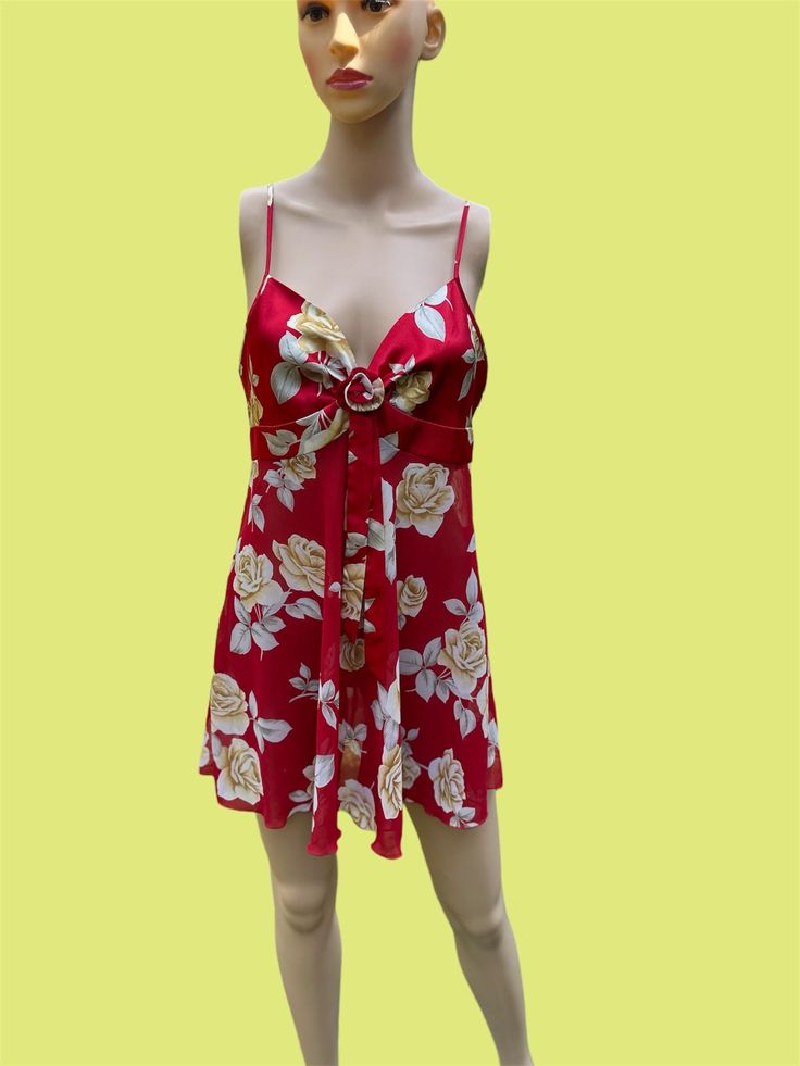 Sure to make you feel like your best most luxurious self while cozied up at home, the Victoria secret babydoll night gown/teddy. The bust is silky, closed with a rose bow,  and the body is mesh and slightly see through. The Brilliant red is brought to life with a silver and gold floral pattern Size small true to size Fits 34" bust the length of the side seam is 21"  Adjustable straps Feminine Satin Summer Nightgown, Feminine Satin Nightgown For Summer, Coquette Summer Party Nightgown, Summer Party Coquette Nightgown, Satin Dresses For Summer Sleepover, Flirty Summer Sleepwear With Built-in Bra, Red Satin Nightgown For Summer, Coquette Spaghetti Strap Summer Nightgown, Coquette Spaghetti Strap Nightgown For Summer