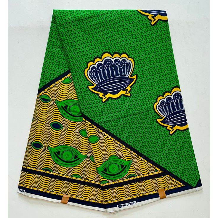 Print: Double- sidedMaterial: 100% CottonWidth: ~45"Texture: Not WaxedMain colors: Green, Yellow, NavyThis beautiful African print satin is perfect for clothing, scarves, and lingerie amongst other uses. Unlike traditional Ankara prints which are often waxed and stiff, this print is very light and flowy so let those creative juices flow and create your own unique masterpiece!Available in increments of up to 6 yards.CARE INSTRUCTIONS: Dryclean recommended. Iron on synthetic. Do NOT bleach.Please Traditional Green Cotton Patterns, Traditional Green Printed Fabric, Traditional Green Fabric With Colorful Pattern, Green Traditional Fabric With Colorful Pattern, Blue Ankara Fabric With Traditional Patterns, Yellow Ankara, Green Ankara Fabric With Colorful Pattern, Green Printed Ankara Fabric, Blue Ankara Print Fabrics