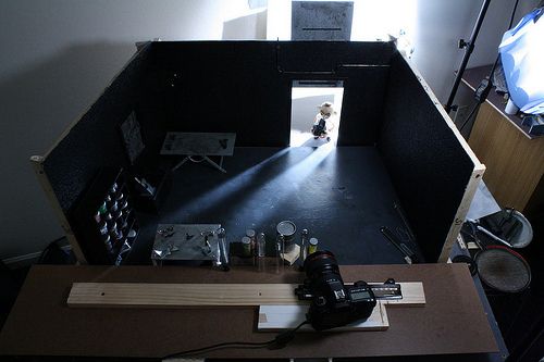 an overhead view of a desk with a camera