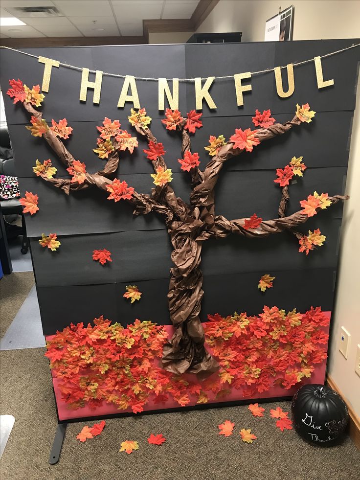 a sign with leaves on it that says, thank you for the fall season and has a tree made out of branches