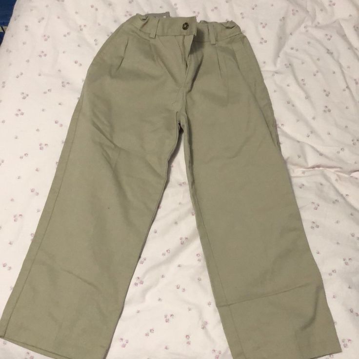 Boys Khaki Pants. Never Worn. High Waist Cotton Bottoms For School, Casual Khaki Cotton Capris, Casual Beige Cotton Capris, Cotton Bottoms With Elastic Waistband For School, Casual School Pants With Elastic Waistband, Casual Pants With Elastic Waistband For School, Cotton School Bottoms With Elastic Waistband, High-waisted Bottoms For School In Spring, Casual Cotton Cargo Pants For School