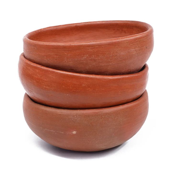 three clay bowls stacked on top of each other