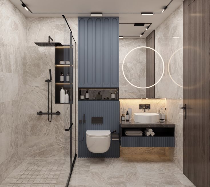 a bathroom with a toilet, sink and shower stall