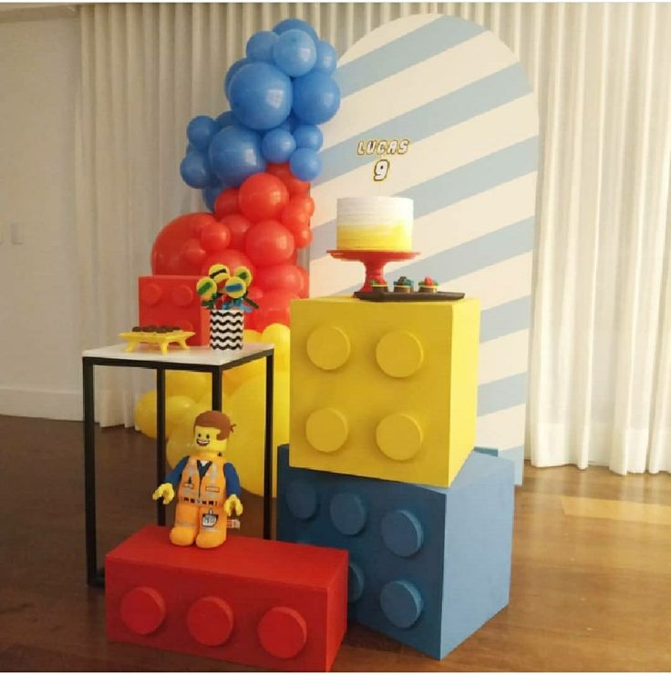 a birthday party with legos and balloons